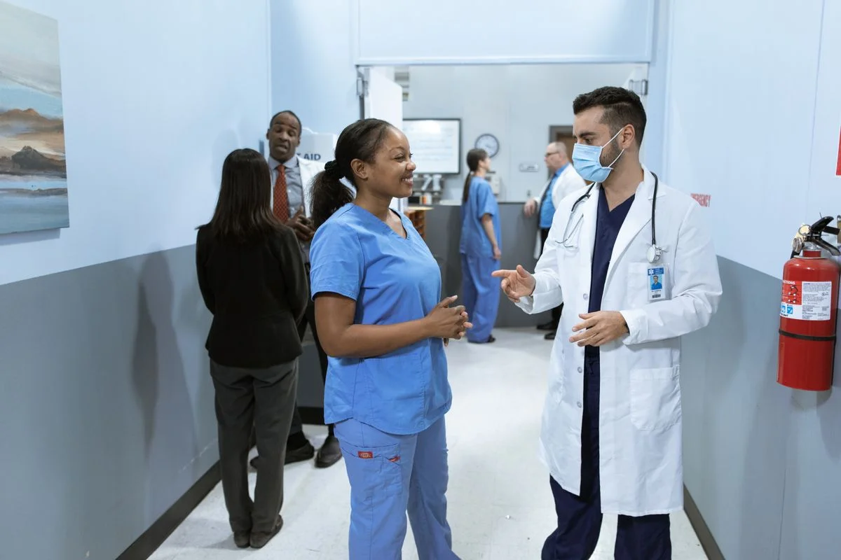 Healthcare professionals discussing in a clinic